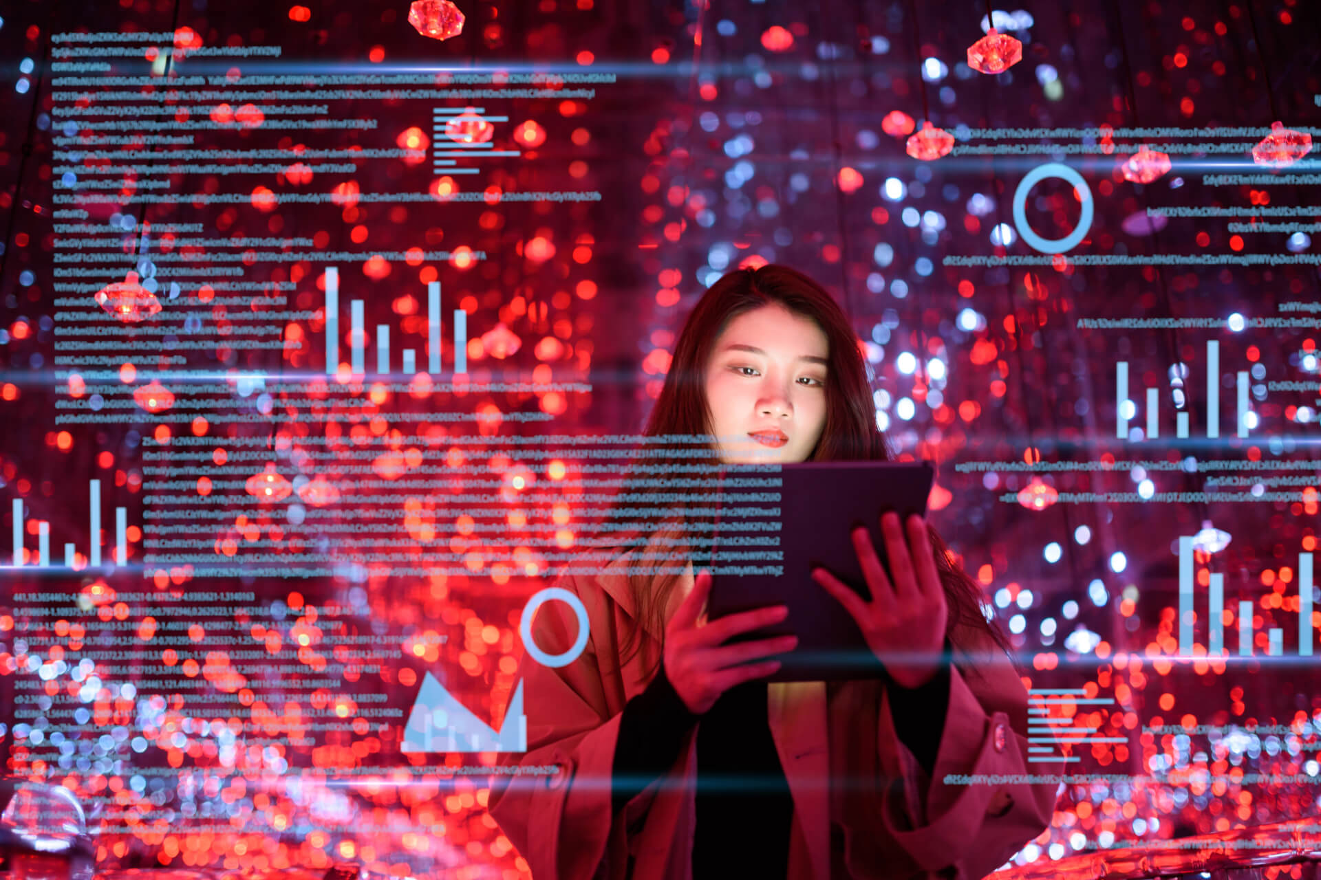 young asian woman uses digital tablet on virtual visual screen at night